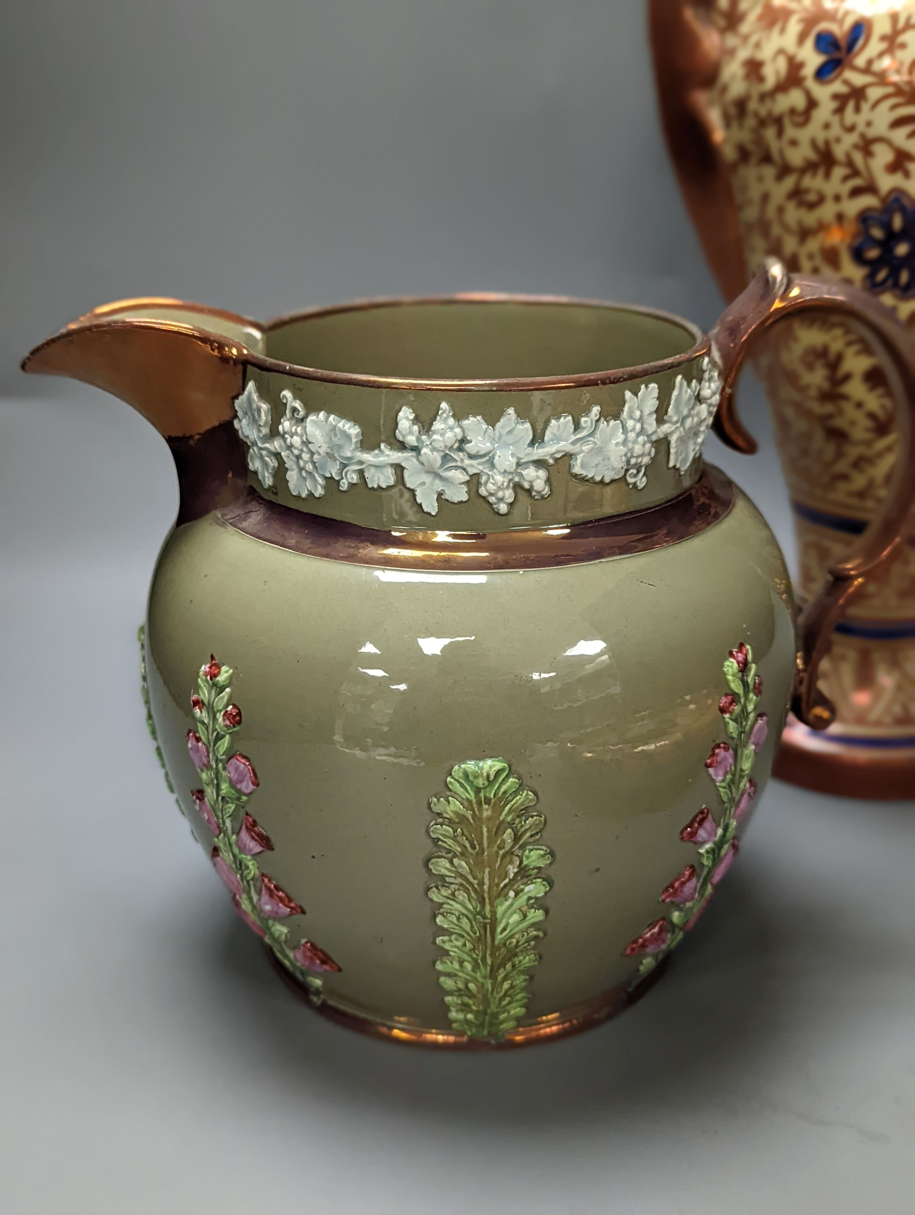 A Burley ware lustre dragon bowl, a lustre and fox glove designed jug and a Hispano-Moresque style copper lustre vase, Vase 38 cms high.
